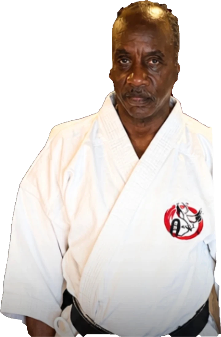 Shihan Abdur Rahiem in a white gi and black belt