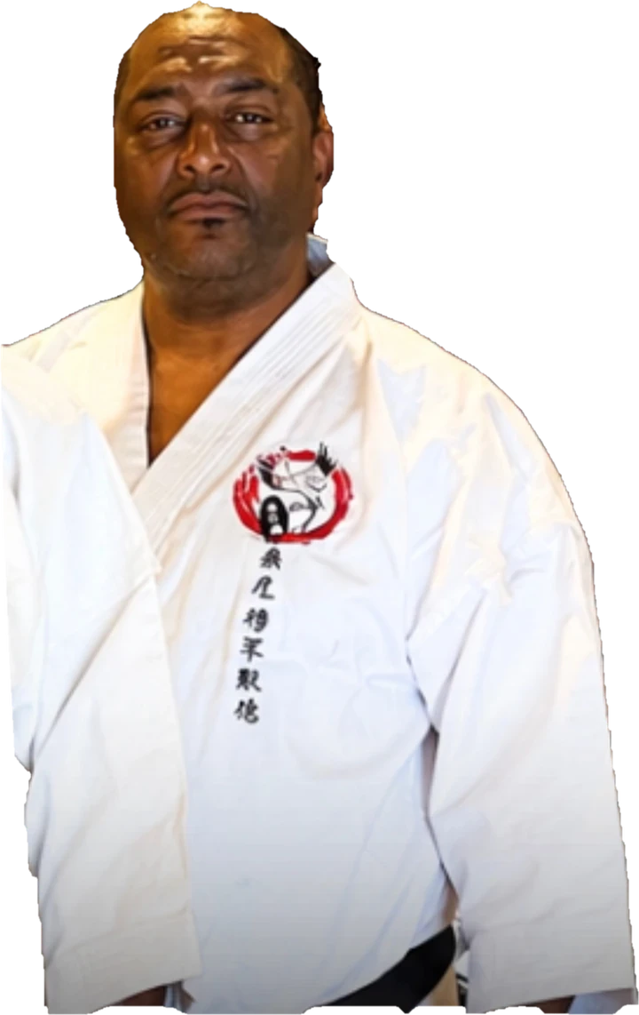 Sensei Sonny Williams Jr. in a white gi and black belt